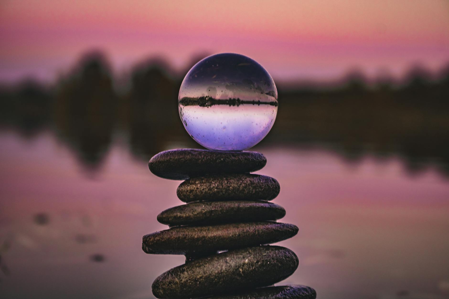 a lensball on a stack of stones